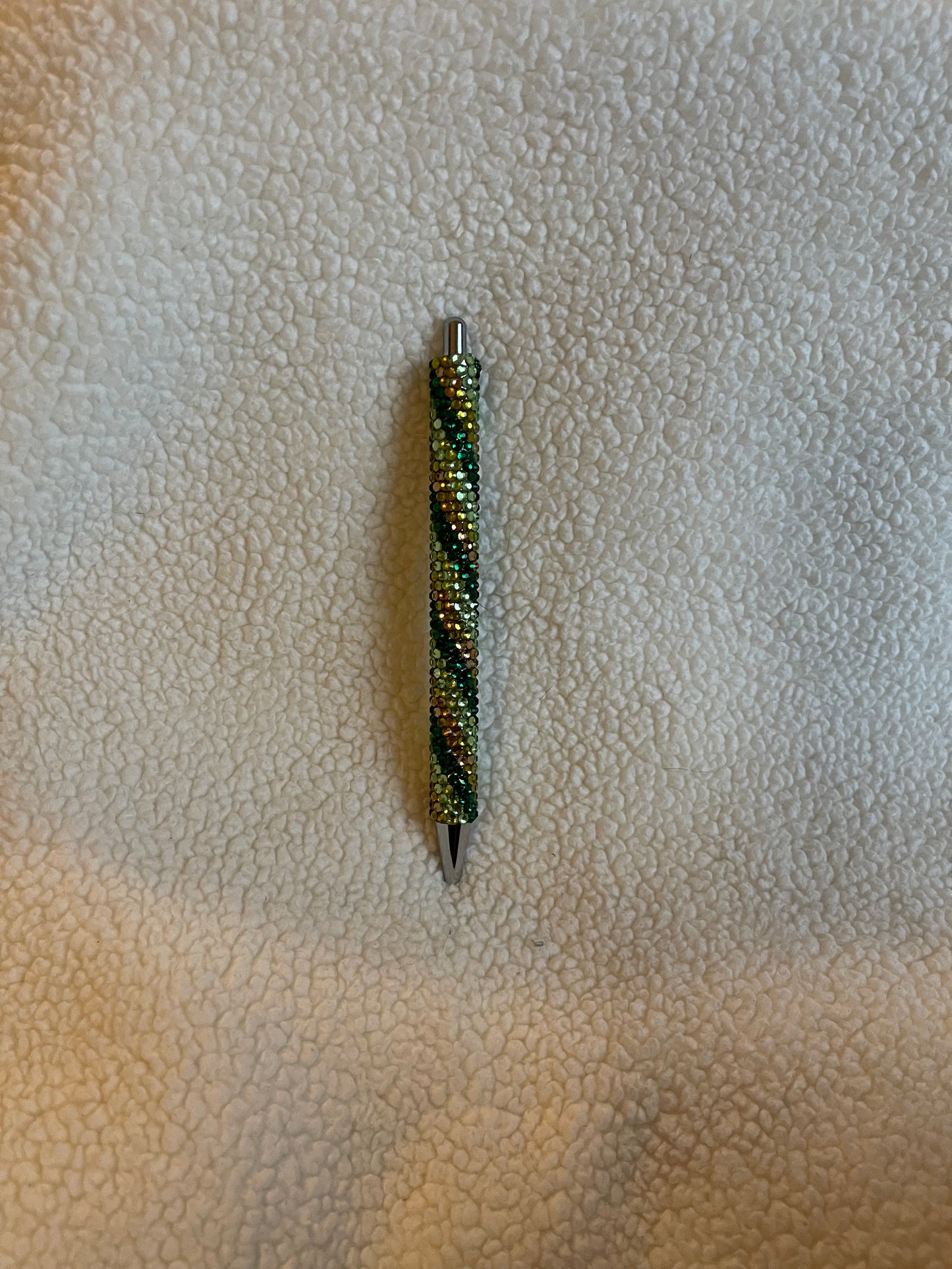 Rhinestone Pen with a variety of green colors in a swirl pattern